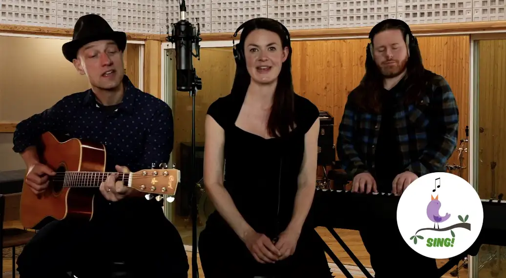 Children singing Blues warm-ups and the song Hear My Train Is Coming